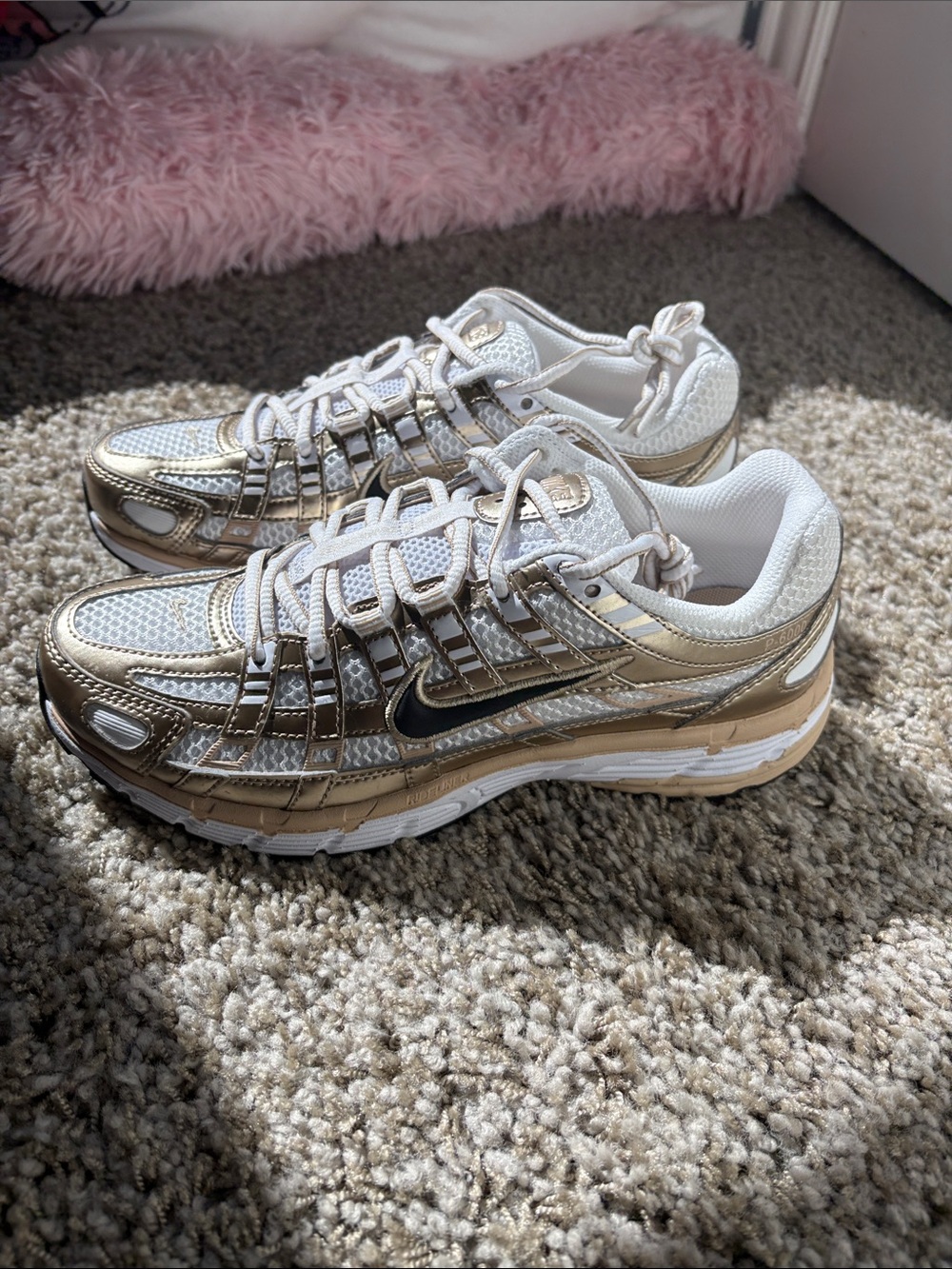 Nike Women’s Metallic Gold and White Sneakers